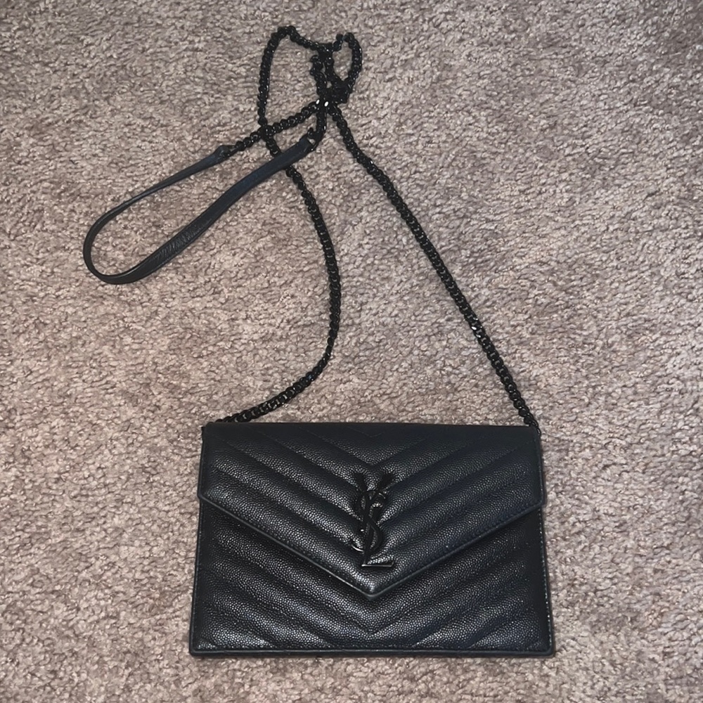 Black YSL wallet on chain